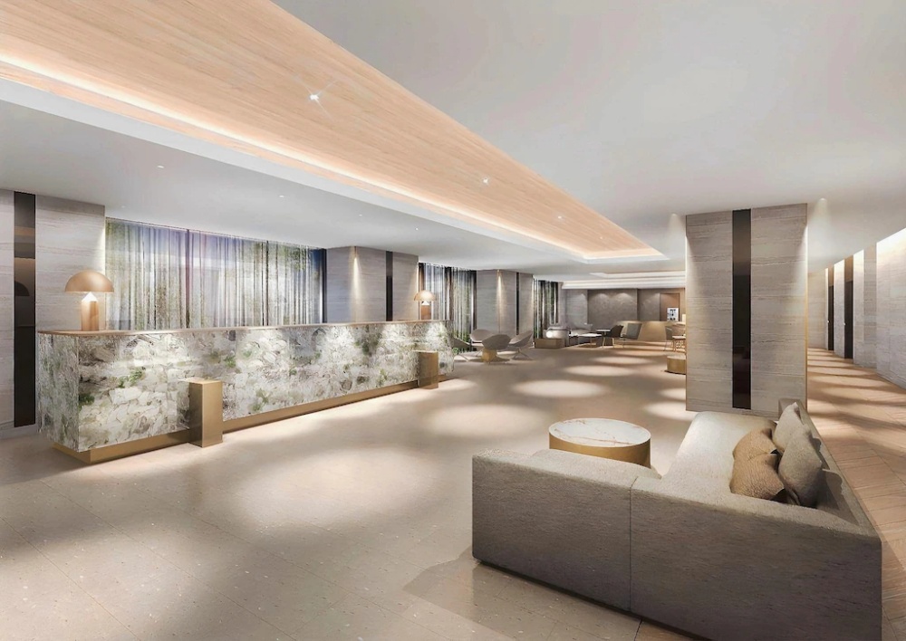 大阪雷本酒店寬敞明亮的大廳，有旅客休息區